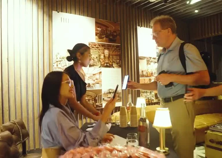 Mantra, Guest reception; frame from the archived IUM project film. Source: https://iumlabs-web.vercel.app/media/home-video/mantra.mp4