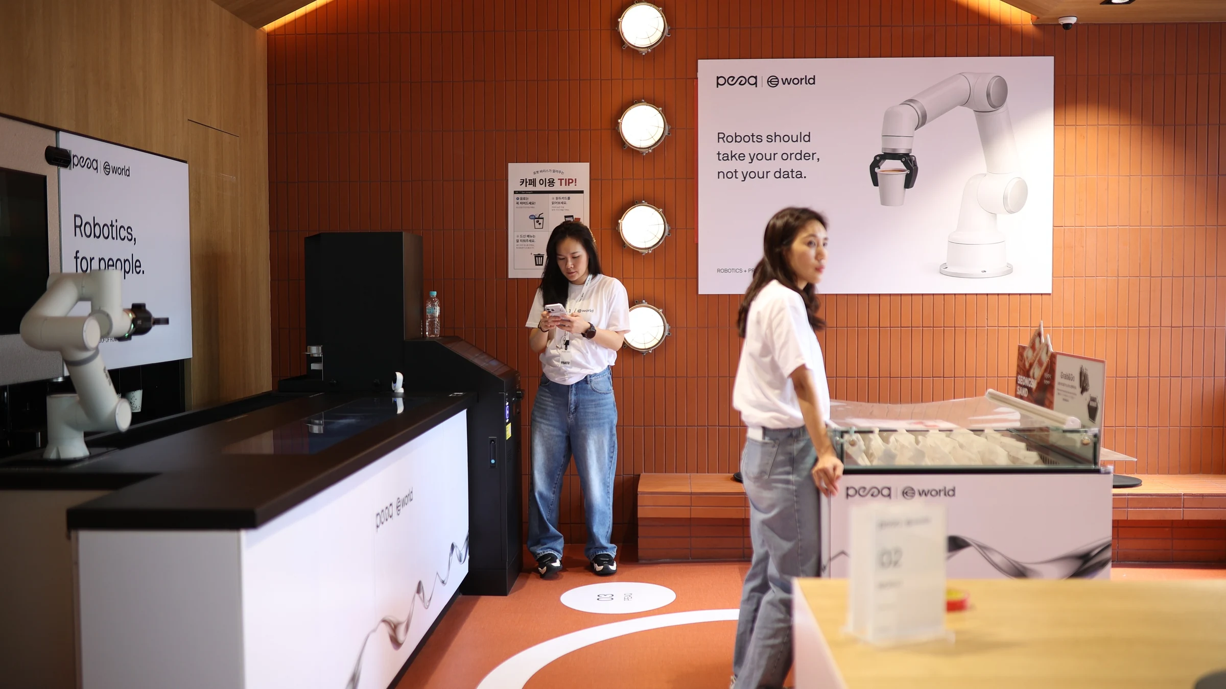 World × peaq: Visitors and exhibits inside the venue, KBW 2026